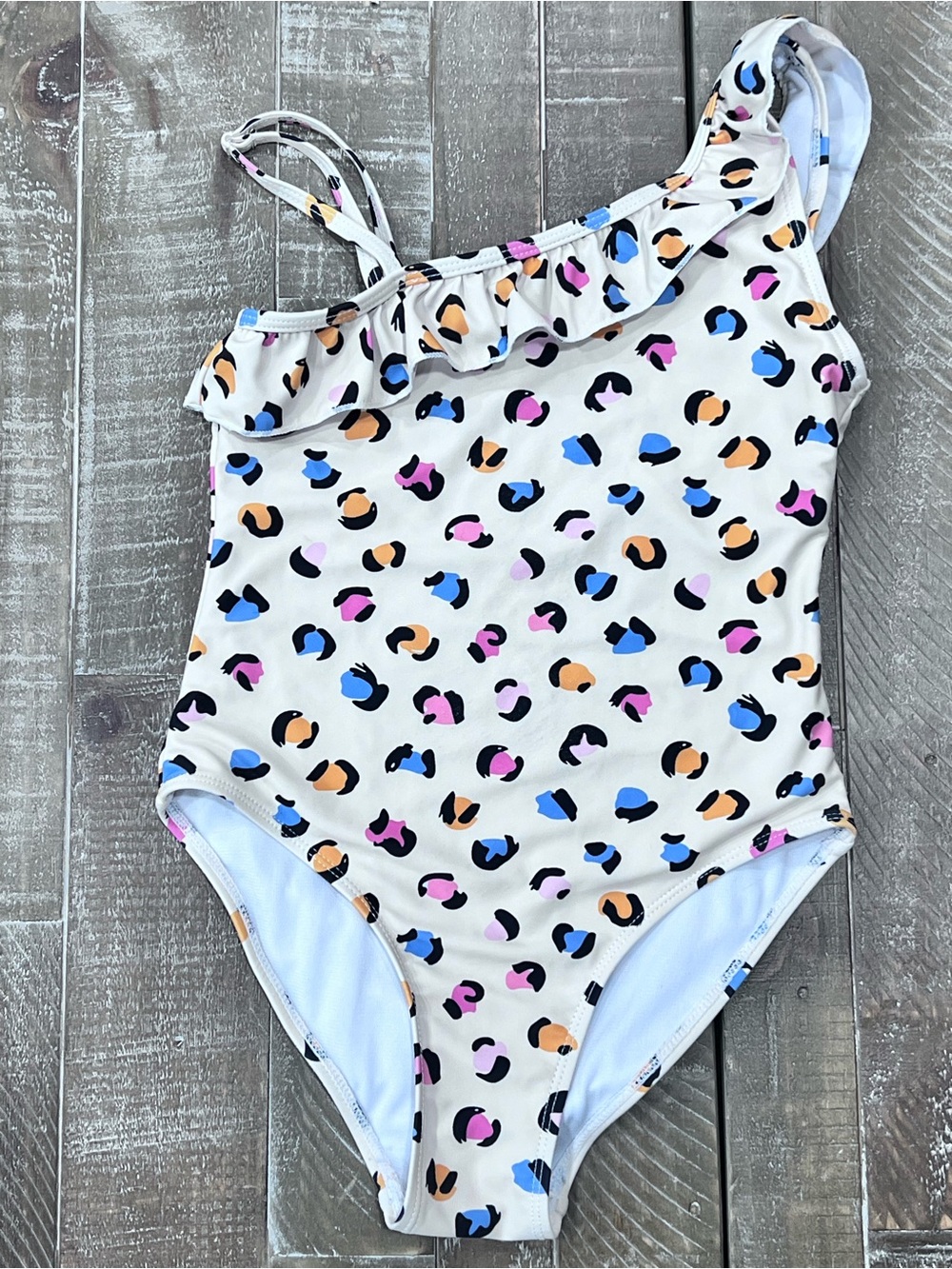 Girls One-Shoulder Ruffle Kids Swimsuit in playful leopard style